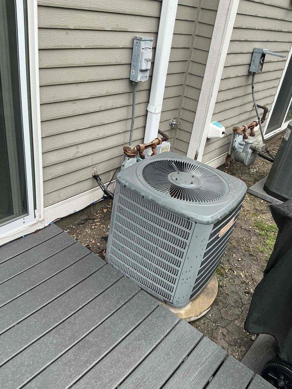 Conducted sales estimate for non-operational Apollo Hydroheat water boiler system located in kitchen area. Assessed existing hydronic heating equipment, documented installation configuration including attic/ceiling access points and exterior HVAC components with refrigerant lines and electrical connections. Customer seeking immediate replacement of failed boiler unit.