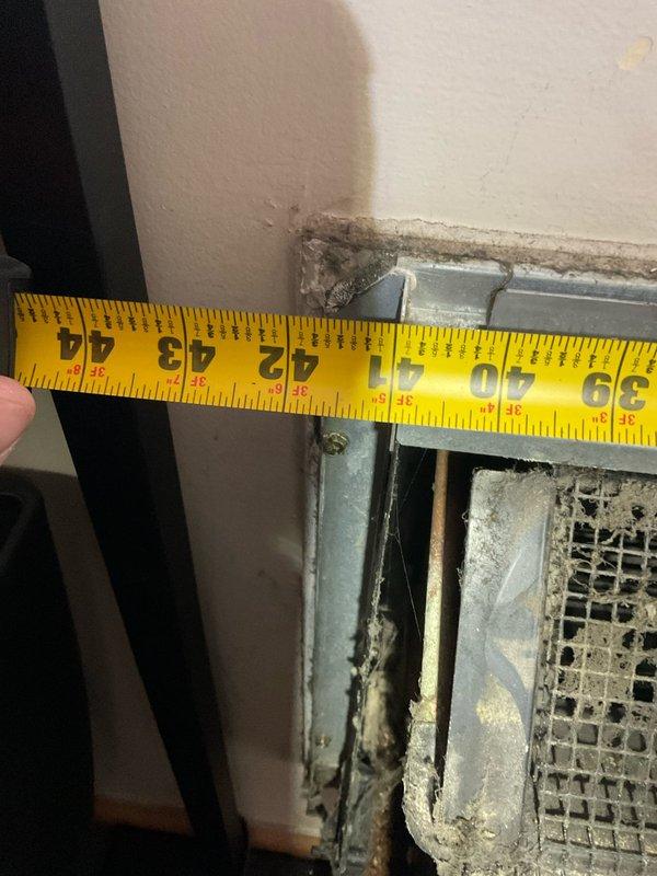 Responded to no heat call for PTAC unit reported to be making loud noise and not heating properly. Upon inspection, found excessive dust and debris accumulation throughout the unit's interior components, including blower motor assembly, copper refrigerant lines, electrical wiring, and flexible ductwork connections. The heavy buildup was identified as the likely cause of both the noise complaint and reduced heating performance. Documented unit condition with interior component photos and measured vent opening dimensions. Unit requires thorough cleaning and maintenance to restore proper operation and eliminate excessive noise.