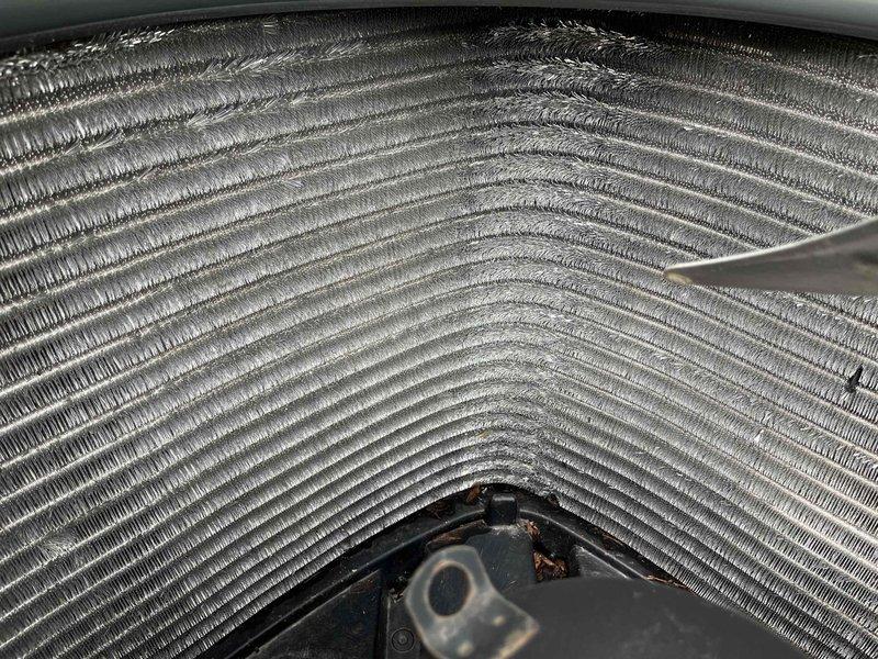 Completed comprehensive BFMA air conditioning tune-up on 10-year-old system. Performed full system inspection including evaporator coil examination, which showed clean fins with proper spacing and good airflow potential. Replaced air filter and verified all components operating within normal parameters for seasonal performance.
