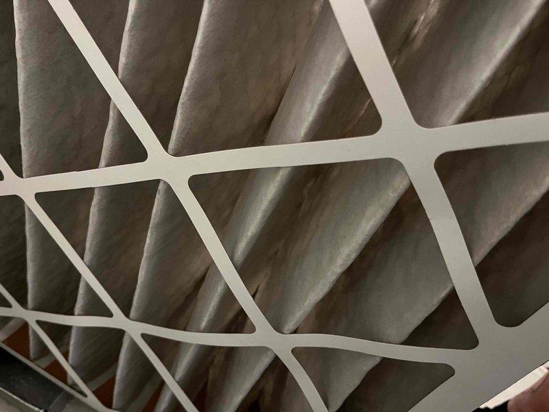 Completed comprehensive BFMA tune-up service on two air conditioning systems, both over 9 years old, during afternoon appointment window. Performed standard maintenance protocol including inspection of condenser coils with aluminum fins, verified refrigerant line connections and copper piping integrity, examined compressor assembly, and assessed air filter condition which showed moderate dust accumulation consistent with normal usage. All components were inspected for proper operation and system performance was verified upon completion.