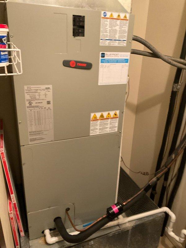 Completed comprehensive air conditioning tune-up on a 2-year-old Trane vertical air handler system located in interior mechanical room and corresponding rooftop condenser units. Performed standard preventative maintenance including filter inspection, refrigerant level verification, electrical connection assessment, condensate drain line check, and operational testing of all system components to ensure optimal performance for the cooling season.