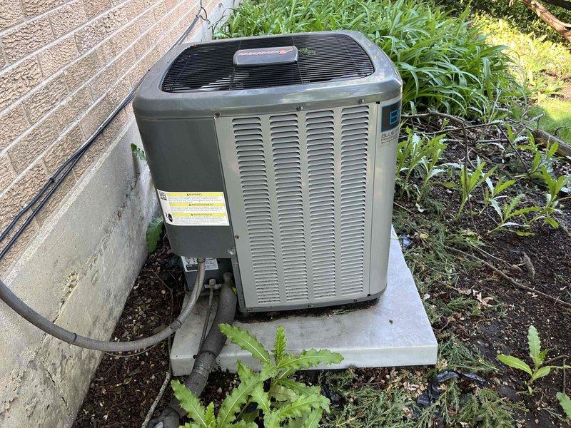 Completed comprehensive BFMA tune-up service on a 4-year-old residential air conditioning system. Performed full system inspection of outdoor condensing unit, verified proper refrigerant line connections, inspected heat exchanger coil fins for cleanliness and debris, and confirmed all components were operating within normal parameters. Unit is functioning properly with no issues identified during the maintenance visit.