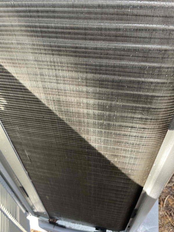 Completed comprehensive BFMA tune-up and maintenance service on 9-month-old air conditioning system. Performed visual inspection of outdoor condenser unit, noting accumulated dirt and debris on condenser coil fins requiring attention during routine maintenance. Inspected attic ductwork system, verifying proper installation and support of flexible ducting with wire reinforcement throughout the air distribution network. All system components operating within normal parameters following tune-up procedures.