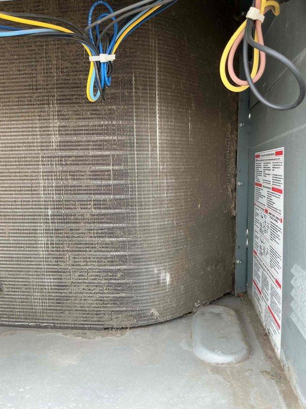 Completed comprehensive BFMA preventive maintenance tune-up on 7-year-old commercial rooftop unit. Performed electrical diagnostics using clamp meter, recording amperage readings and verifying proper voltage to compressor and system components. Inspected all electrical connections, control board functionality, and wiring integrity within the RTU cabinet. Examined compressor assembly, verified proper operation of all mechanical components, and documented system performance parameters to ensure optimal efficiency and reliability for continued service.