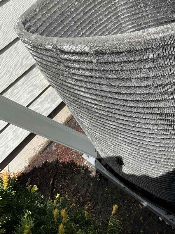 Completed comprehensive BFMA tune-up on residential outdoor air conditioning unit with cylindrical heat exchanger design. Performed standard maintenance procedures including inspection of condenser coils, electrical connections, refrigerant levels, and overall system operation to ensure optimal performance for the cooling season. Unit confirmed operational with all components functioning within manufacturer specifications.