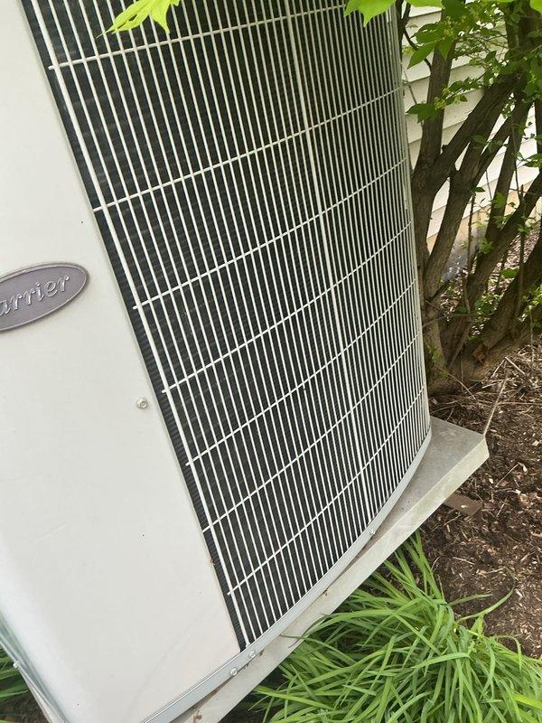 Completed comprehensive air conditioning tune-up on older Carrier condensing unit. Performed standard maintenance protocol including refrigerant charge verification using manifold gauges, electrical system inspection with access panel removed, and thorough examination of condenser coil condition. Unit operating within normal parameters upon completion of service.