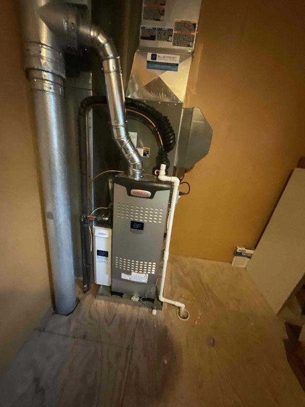 Completed full HVAC split system installation including 80% efficiency upflow gas furnace in second floor closet and air conditioning condenser unit. Relocated existing condenser 12 feet from original position to accommodate site requirements. Installed new ductwork connections, refrigerant lines, condensate drain piping, and electrical wiring to both indoor and outdoor units. Preserved existing upstairs furnace per customer request while integrating new system components. Tested all equipment for proper operation, verified airflow, checked refrigerant charge, and ensured all safety controls functioning correctly.