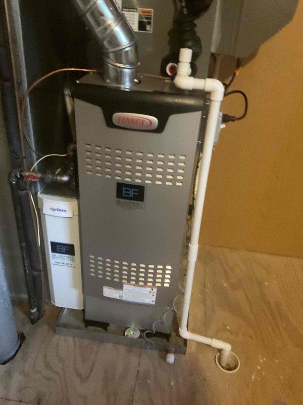 Completed full HVAC split system installation including 80% efficiency upflow gas furnace in second floor closet and air conditioning condenser unit. Relocated existing condenser 12 feet from original position to accommodate site requirements. Installed new ductwork connections, refrigerant lines, condensate drain piping, and electrical wiring to both indoor and outdoor units. Preserved existing upstairs furnace per customer request while integrating new system components. Tested all equipment for proper operation, verified airflow, checked refrigerant charge, and ensured all safety controls functioning correctly.