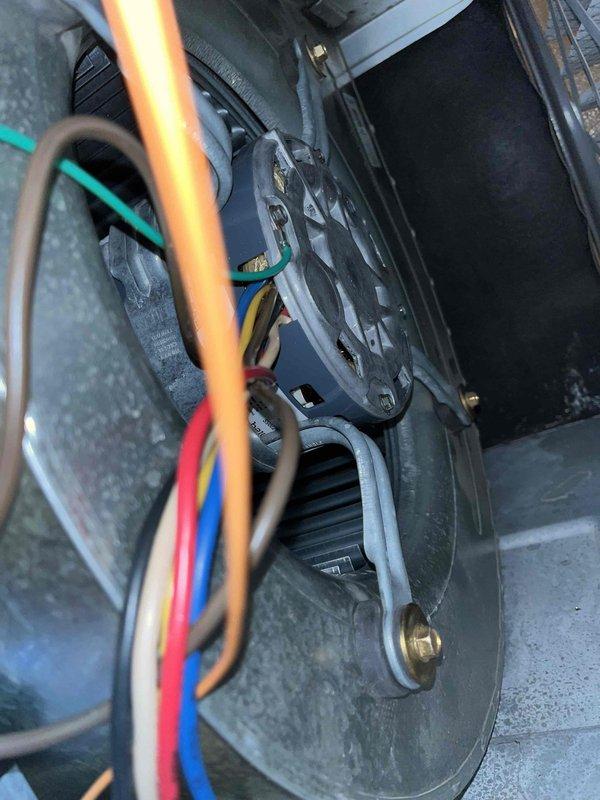 Replaced failed blower motor and wheel assembly in second floor furnace unit. Removed old blower wheel with damaged blades and worn motor, installed new squirrel cage blower wheel with properly spaced blades and new motor assembly, verified proper electrical connections and tested system operation to ensure adequate airflow restoration.