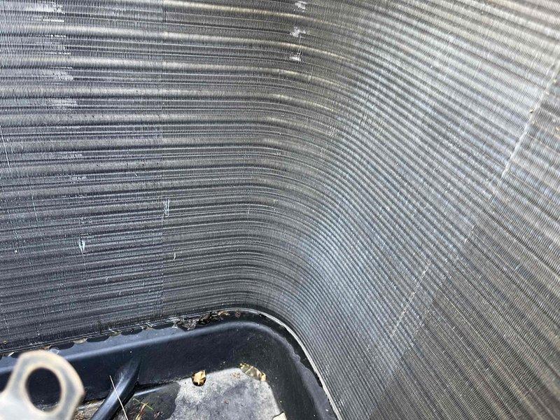 Completed comprehensive BFMA preventive maintenance tune-up on dual outdoor air conditioning units, approximately 2 years old. Performed full system inspection including cleaning of condenser coils, verification of refrigerant levels, electrical connections check, and amperage draw testing. Evaporator coils showed minor dust accumulation which was addressed during service, and drain pan was inspected with minor debris removal performed to ensure proper condensate drainage and prevent future blockages.