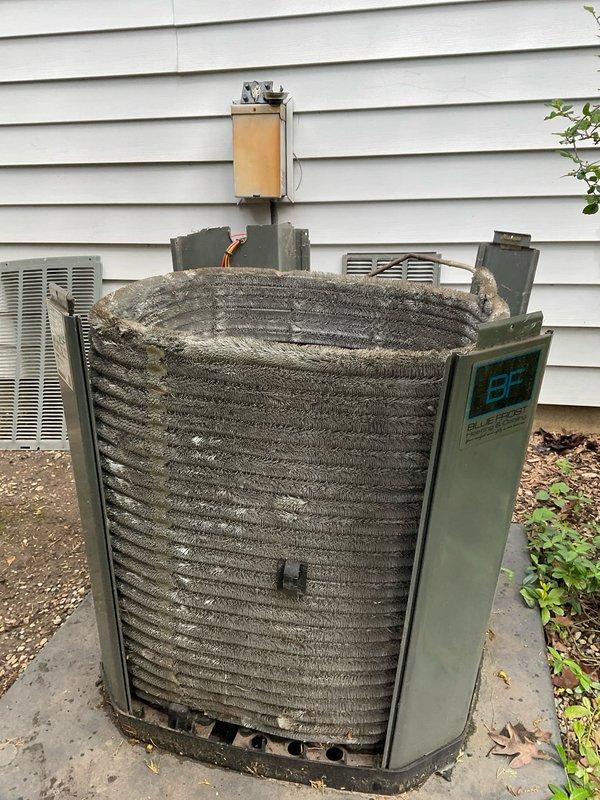 Completed comprehensive BFMA tune-up service on 4-year-old BDP air conditioning system. Performed thorough cleaning of heavily soiled condenser coil which exhibited significant dust and debris accumulation in fins, replaced air filter as part of semi-annual air cleaner maintenance, and conducted full AC system inspection. Unit was found operational with outdoor condensing unit showing normal weathering for age; all routine maintenance tasks completed per BFMA service protocol.