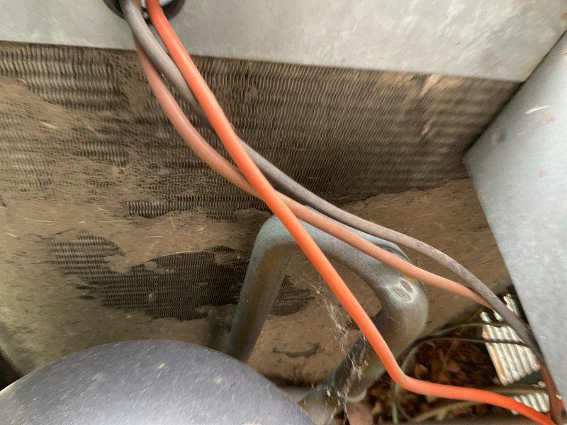 Completed comprehensive AC and furnace tune-up maintenance at residential property. Inspected Rheem outdoor condensing unit, verified proper operation of compressor and condenser fan, and cleaned evaporator coils which showed significant dust and debris accumulation with visible streaking patterns. Checked all electrical connections, refrigerant levels, and system controls to ensure optimal performance for the cooling season.