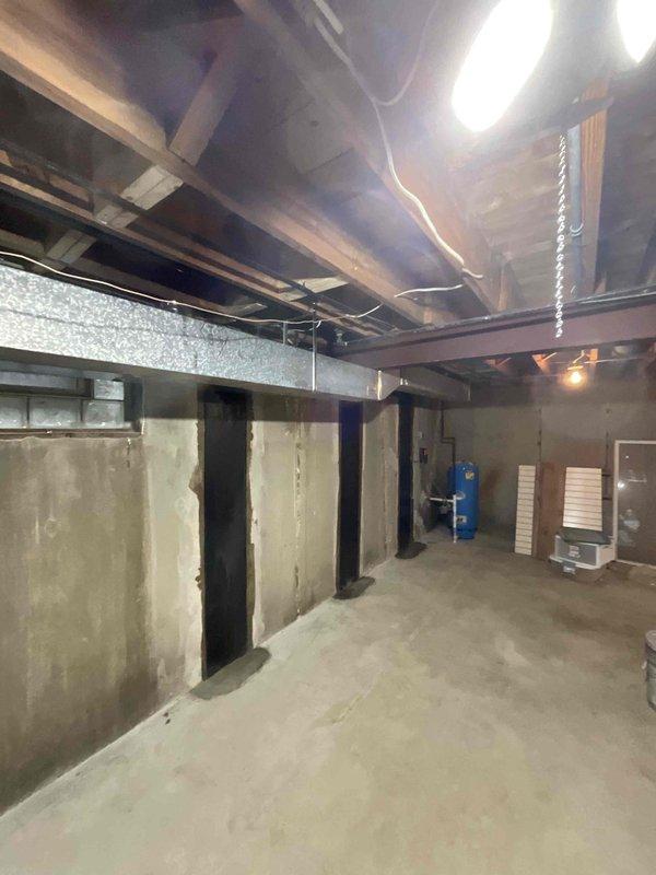 Completed installation of 30 linear feet of 8x8 square galvanized ductwork in unfinished basement area to replace previously removed duct runs. Work was performed with homeowner offsite using provided access code. New ductwork was installed between two existing runs to restore proper airflow distribution throughout the HVAC system. All metal duct connections were secured and sealed to manufacturer specifications. Drywall repair and finishing around new ductwork to be completed by others as specified in work order.