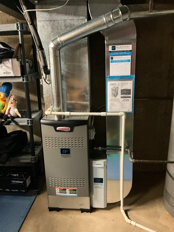 Completed comprehensive BFMA tune-up service on residential HVAC system consisting of one 16+ year old air conditioning unit and one 5-month old Lennox furnace with AprilAire humidifier integration. Performed standard maintenance procedures including filter inspection, system operation verification, electrical connection checks, condensate drain line assessment, and thermostat calibration on both heating and cooling equipment. All components found operating within manufacturer specifications with no immediate repairs required at time of service.