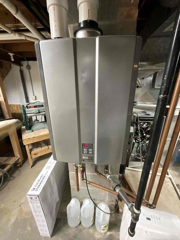 Completed comprehensive BFMA tune-up service on residential HVAC system with equipment over 2 years old, scheduled for afternoon arrival with 30-minute notice. Performed standard air conditioning maintenance protocol including inspection of evaporator coil, refrigerant lines, electrical connections, and safety controls. Documented system components including heat exchanger coil condition, copper refrigerant piping, electrical wiring harness, and associated mechanical equipment with photographic evidence for service records.
