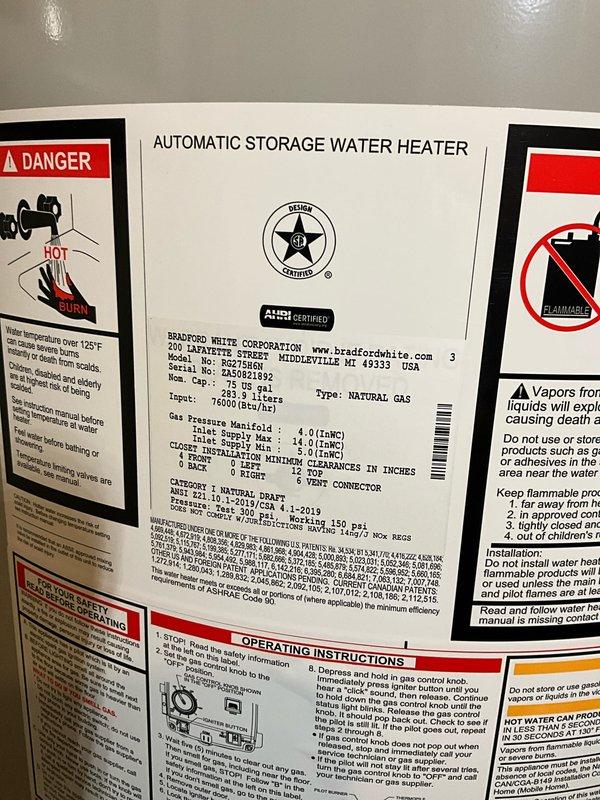 Completed comprehensive plumbing inspection and maintenance tune-up at residential property. Inspected Bradford White natural gas water heater manufactured March 2019, verified proper operation and safety label compliance, and documented unit specifications including 73.8-liter capacity. Performed visual inspection of bathroom plumbing fixtures including shower valve assembly and chrome fixtures, confirming all components functioning properly with no leaks or operational concerns identified.