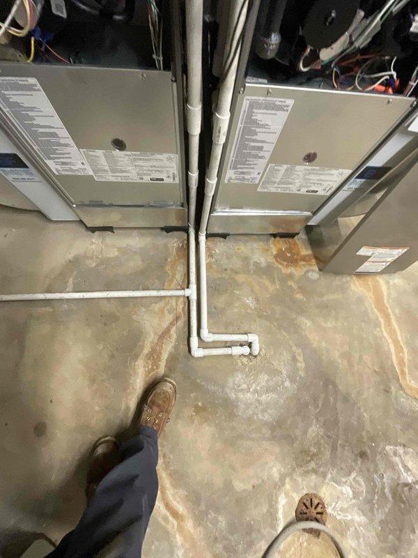 Completed full replacement of dual-zone Lennox furnace system serving first and second floors. Installed two EL297UH070V36B high-efficiency gas furnaces with corresponding AA1210 air handlers in attic location, configured for independent zone control. Mounted and programmed Ecobee smart thermostats for both zones, establishing proper communication with equipment and verifying all heating sequences, safety controls, and airflow parameters met manufacturer specifications.