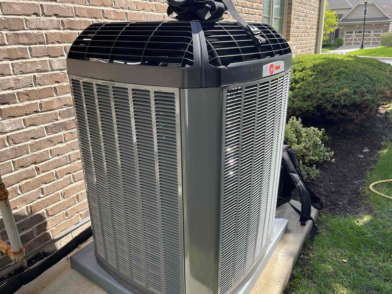 Completed comprehensive BFMA tune-up service on a 4+ year old Trane air conditioning system during morning hours. Performed full system inspection including evaporator coil evaluation, which revealed moderate dust and debris accumulation on the fins requiring attention, and exterior condenser unit assessment showing equipment in overall good operating condition. All standard preventative maintenance procedures were executed according to manufacturer specifications to ensure optimal system performance and efficiency.