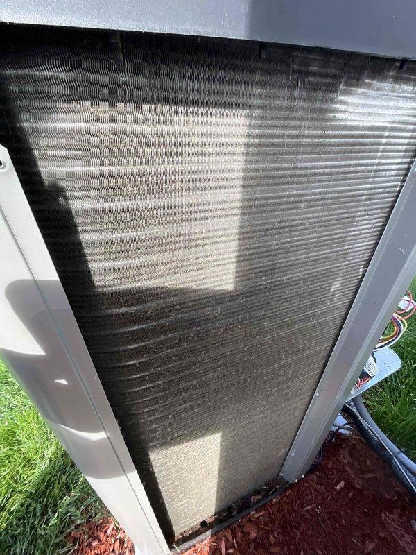 Completed comprehensive BFMA tune-up on 8-month-old outdoor HVAC unit. Performed full system inspection including condenser coil examination, which showed moderate accumulation of dirt and debris on exterior fins, and verified blower wheel assembly operation. All components found in good working condition with no immediate repairs required; system operating within normal parameters for equipment age.