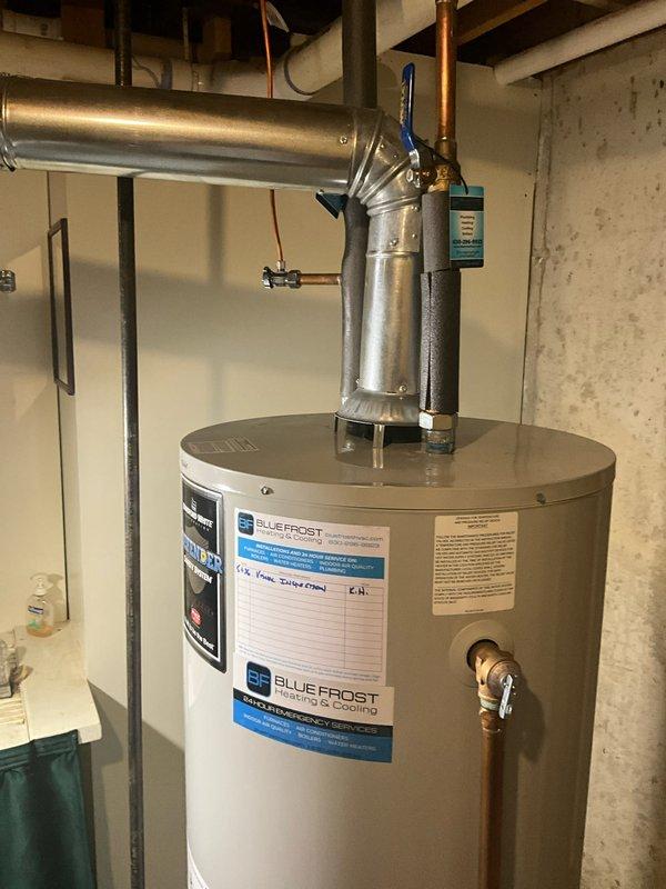 Completed comprehensive plumbing inspection as part of preventative maintenance tune-up service. Inspected and documented water heater installation with proper venting and expansion tank configuration, verified all plumbing connections and valves for proper operation. Evaluated sump pump system and battery backup unit in basement, confirmed discharge piping secured appropriately with mounting hardware, and noted existing moisture indicators on foundation walls for homeowner awareness.