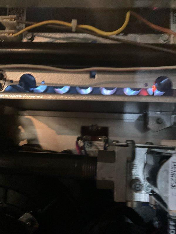 Completed comprehensive furnace tune-up and mini split maintenance on residential HVAC system. Performed full inspection of gas furnace including burner assembly operation, flame sensor cleaning, heat exchanger examination, and electrical connection verification. Burner flames observed operating with proper blue flame pattern indicating correct air-fuel mixture and combustion efficiency. Inspected all visible wiring connections, including control wiring and safety circuits. Evaluated furnace cabinet condition and internal components for wear or deterioration. Checked blower assembly, filter condition, and airflow pathways. Tested all safety controls including limit switches and flame rollout sensors. Verified proper gas pressure and manifold operation. Performed maintenance on mini split system including filter inspection, condensate drain check, and operational testing of both indoor and outdoor units. All equipment confirmed operational with no immediate safety concerns identified. S