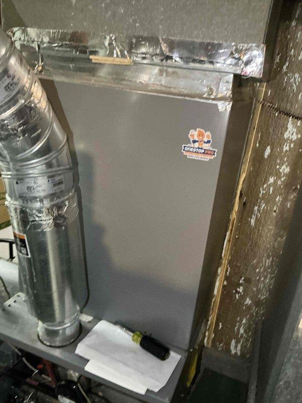 Completed sales estimate for furnace replacement on residential HVAC system. Customer currently has heat but experienced heat exchanger issues during previous service call last year and is proactively exploring replacement options before next heating season. Inspected existing air handler unit and ductwork system located in attic space, documented equipment condition and configuration including supply plenum, damper controls, and foil-wrapped ductwork connections. Photographed current system setup to assess replacement requirements and proper equipment sizing for home comfort needs.