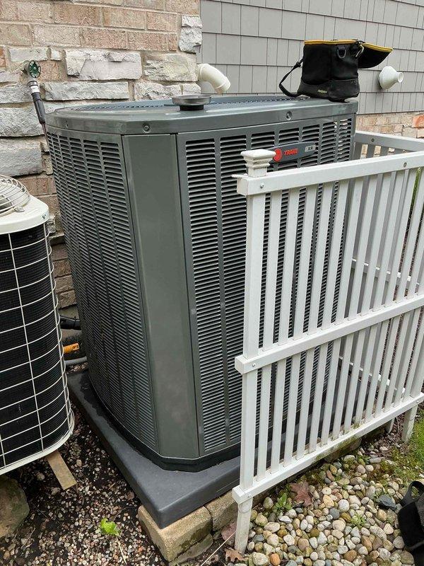 Completed comprehensive BFMA tune-up on 5-year-old Trane air conditioning system. Performed electrical diagnostics on indoor air handler unit, measuring voltage and amperage readings to verify proper compressor operation and system performance. Inspected outdoor condenser unit, confirmed proper installation on equipment pad, and verified all system components are operating within manufacturer specifications for optimal cooling efficiency.