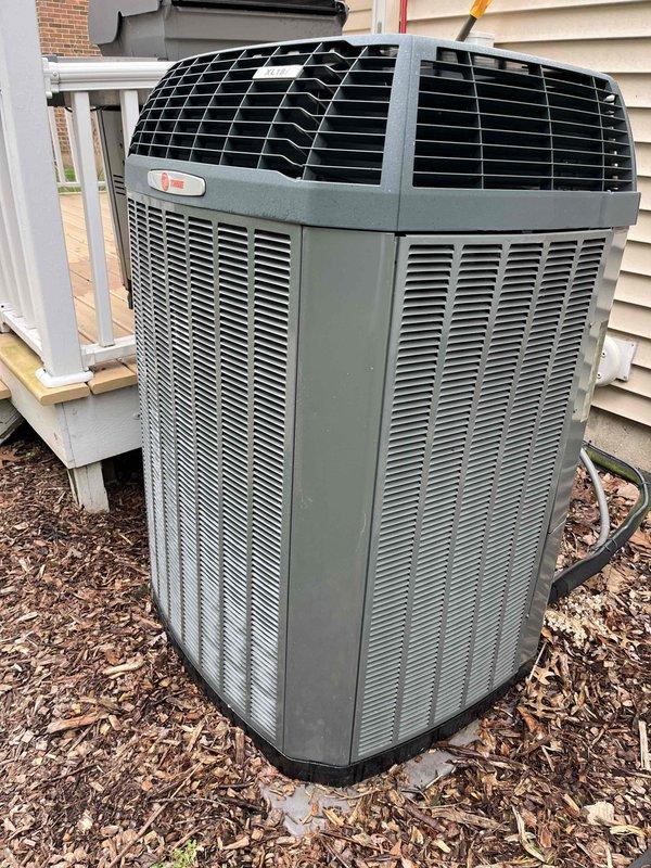 Completed comprehensive BFMA tune-up service on a 12+ year old residential air conditioning system during afternoon hours. Performed standard AC maintenance procedures including inspection of outdoor condenser unit, verification of proper airflow through clean evaporator coil assembly, and assessment of overall system operation. Unit found in functional condition with components showing normal outdoor weathering but no significant deterioration requiring immediate attention.