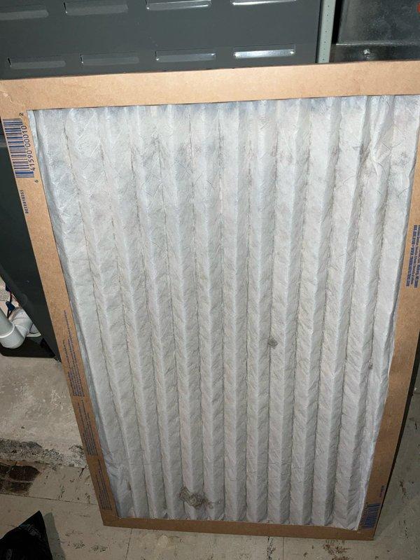 Performed comprehensive BFMA tune-up service on residential Trane air conditioning system aged 3+ years. Conducted complete system inspection of outdoor condensing unit, verified operational parameters, and replaced standard pleated air filter showing moderate dust accumulation. All components inspected and found operating within manufacturer specifications, with system ready for continued seasonal operation.