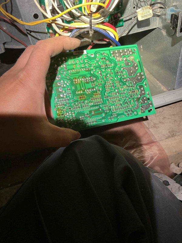 Replaced faulty control board on HVAC unit. Retrieved replacement part and successfully installed new green PCB, connecting all wire harnesses including yellow, red, blue, green, white, and black wires to proper terminals within the control panel enclosure. System tested and restored to normal operation.