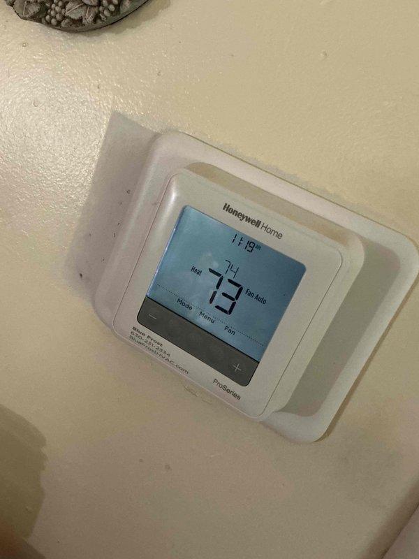 Completed comprehensive air conditioning tune-up on one-year-old system. Performed standard maintenance inspection of thermostat operation, verified proper temperature display and control settings, and inspected HVAC control board and electrical connections. All circuit boards, wiring harnesses, and system components found to be in good working condition with no issues identified.