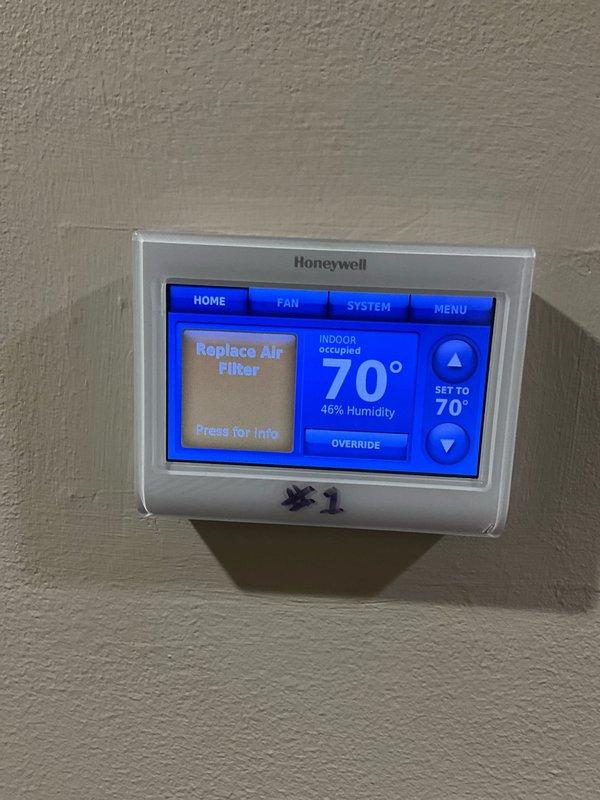 Completed comprehensive BFMA tune-up service on an 8-year-old HVAC system with dual-zone configuration. Performed standard maintenance procedures including filter inspection, system diagnostics, and operational testing on both Zone #1 and Zone #2 thermostats, verifying proper temperature control, humidity readings, and heating functionality. All systems operating within normal parameters with thermostats displaying accurate readings and responding correctly to setpoint adjustments.