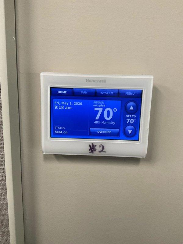 Completed comprehensive BFMA tune-up service on an 8-year-old HVAC system with dual-zone configuration. Performed standard maintenance procedures including filter inspection, system diagnostics, and operational testing on both Zone #1 and Zone #2 thermostats, verifying proper temperature control, humidity readings, and heating functionality. All systems operating within normal parameters with thermostats displaying accurate readings and responding correctly to setpoint adjustments.