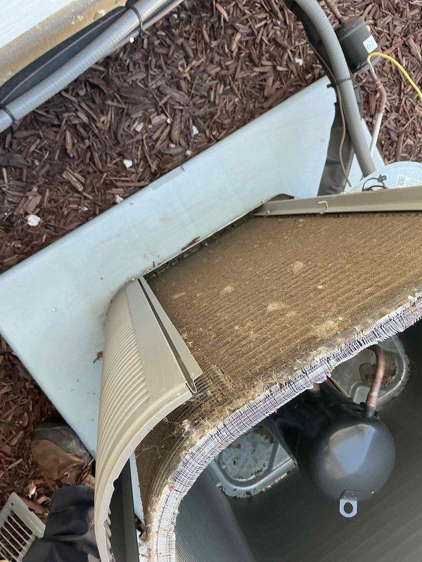 Completed comprehensive BFMA tune-up service on residential air conditioning system with equipment aged 1+ years. Performed thorough inspection and cleaning of outdoor condenser unit, which showed significant dirt and debris accumulation on heat exchanger coils. Cleaned condenser coils to restore optimal heat transfer efficiency and airflow. System was tested and confirmed operational following maintenance procedures. Service prioritized as first appointment to accommodate homeowner's schedule prior to property closing.
