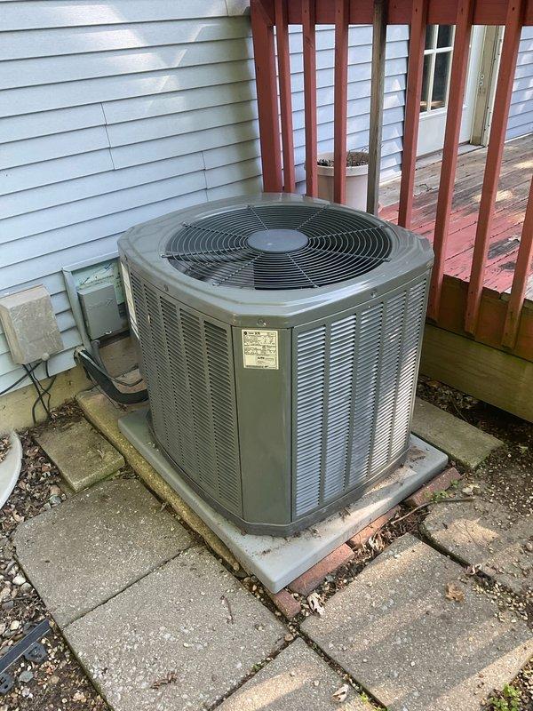 Completed comprehensive BFMA tune-up on 8+ year old outdoor air conditioning condenser unit. Performed standard maintenance protocol including inspection of coil assembly, which revealed heavy accumulation of dust, dirt, and debris between condenser fins requiring thorough cleaning. Verified electrical disconnect box operation, inspected unit mounting on concrete pad, and assessed overall system condition to ensure proper functionality for continued operation.