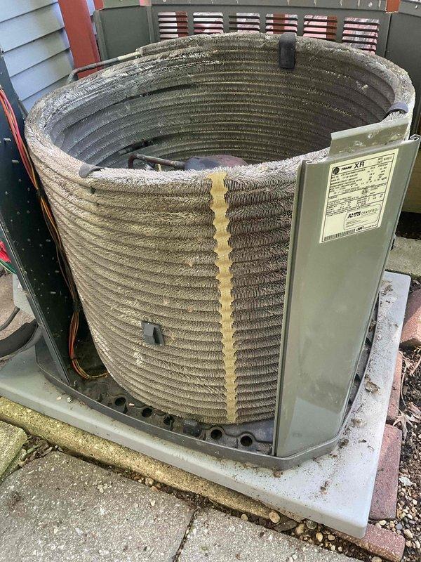 Completed comprehensive BFMA tune-up on 8+ year old outdoor air conditioning condenser unit. Performed standard maintenance protocol including inspection of coil assembly, which revealed heavy accumulation of dust, dirt, and debris between condenser fins requiring thorough cleaning. Verified electrical disconnect box operation, inspected unit mounting on concrete pad, and assessed overall system condition to ensure proper functionality for continued operation.