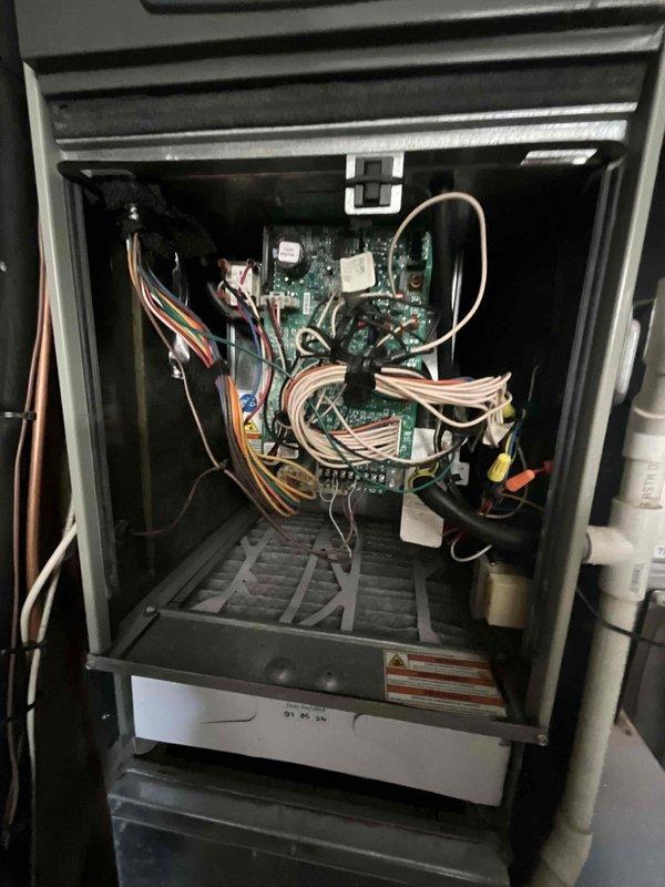 Completed comprehensive BFMA tune-up on 11+ year old air conditioning system. Performed thorough inspection of outdoor condenser unit, noting dirt and debris accumulation on coils requiring attention. Accessed indoor air handler control compartment, inspected all electrical connections, circuit boards, and wiring harnesses to ensure proper operation and safety. All components evaluated and system tested for optimal performance.