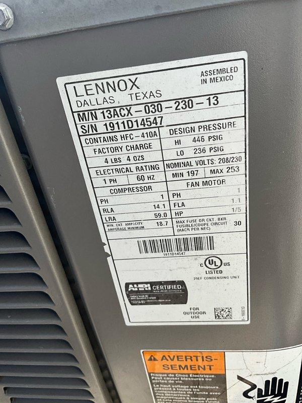 Completed comprehensive AC tune-up and preventive maintenance service on a 14-year-old Lennox 13ACX-030-230-13 condensing unit containing R-410A refrigerant. Performed full system inspection, cleaned condenser coils, checked electrical connections, verified proper refrigerant charge of 4 lbs 4 oz, tested capacitor and contactor operation, and confirmed unit is operating within manufacturer specifications at 208/230V nominal voltage.