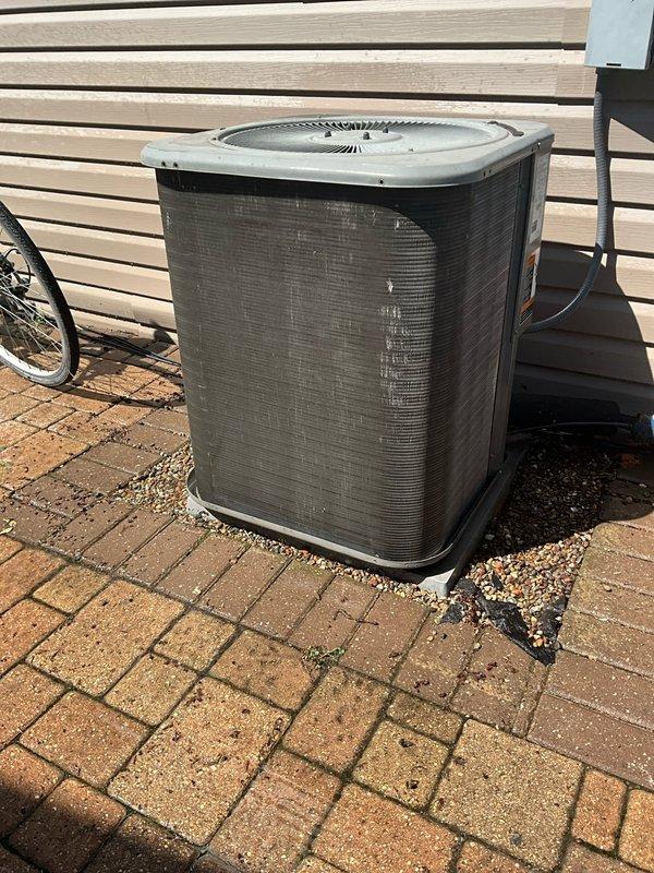 Completed comprehensive AC tune-up and preventive maintenance service on a 14-year-old Lennox 13ACX-030-230-13 condensing unit containing R-410A refrigerant. Performed full system inspection, cleaned condenser coils, checked electrical connections, verified proper refrigerant charge of 4 lbs 4 oz, tested capacitor and contactor operation, and confirmed unit is operating within manufacturer specifications at 208/230V nominal voltage.