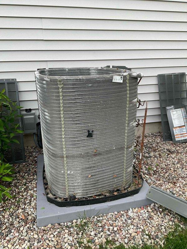 Completed comprehensive annual maintenance on residential air conditioning system. Performed visual inspection of outdoor condenser unit, noting accumulated debris and organic matter between coil fins. Cleaned condenser coils to remove dirt, leaves, and buildup affecting heat transfer efficiency. Inspected refrigerant lines, electrical connections, and mounting hardware for proper installation and secure connections. Verified unit operation and confirmed system is functioning within normal parameters for upcoming cooling season.