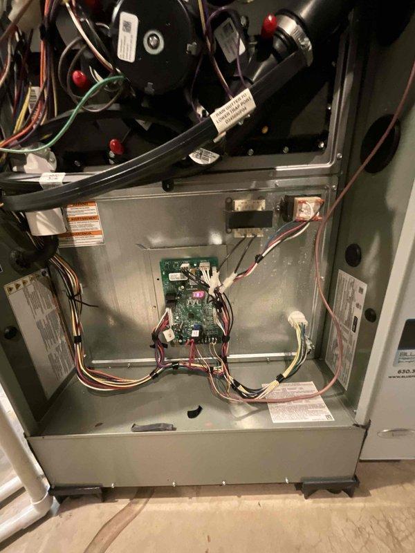 Completed comprehensive BFMA tune-up service on 6+ year old HVAC system. Performed thorough inspection of indoor air handler unit, verifying proper operation of blower motor, control board connections, and electrical components. Cleaned heavily contaminated outdoor condenser unit coils which showed significant accumulation of dirt, dust, and debris between fins, restricting airflow and reducing system efficiency. Removed organic debris including leaves and plant matter from base of outdoor unit. Verified all electrical connections, tested system operation, and confirmed unit is functioning within normal parameters.