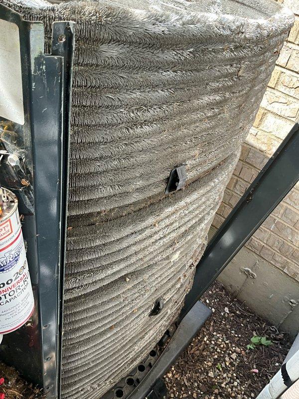 Completed comprehensive BFMA tune-up service on 6+ year old HVAC system. Performed thorough inspection of indoor air handler unit, verifying proper operation of blower motor, control board connections, and electrical components. Cleaned heavily contaminated outdoor condenser unit coils which showed significant accumulation of dirt, dust, and debris between fins, restricting airflow and reducing system efficiency. Removed organic debris including leaves and plant matter from base of outdoor unit. Verified all electrical connections, tested system operation, and confirmed unit is functioning within normal parameters.