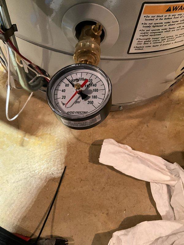 Completed comprehensive plumbing inspection as part of maintenance tune-up service. Inspected water heater system including pressure relief valve, temperature and pressure gauge readings, and all connections for proper operation and safety compliance. Evaluated bathroom plumbing fixtures including tub/shower assembly, verifying proper function of single-handle faucet control, showerhead, tub spout, and drain assembly with no leaks or operational issues identified.