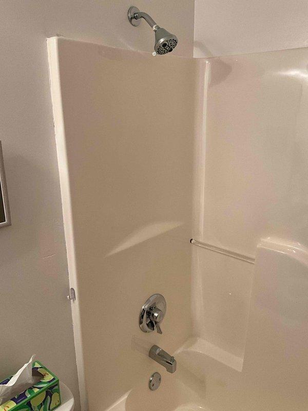 Completed comprehensive plumbing inspection as part of maintenance tune-up service. Inspected water heater system including pressure relief valve, temperature and pressure gauge readings, and all connections for proper operation and safety compliance. Evaluated bathroom plumbing fixtures including tub/shower assembly, verifying proper function of single-handle faucet control, showerhead, tub spout, and drain assembly with no leaks or operational issues identified.