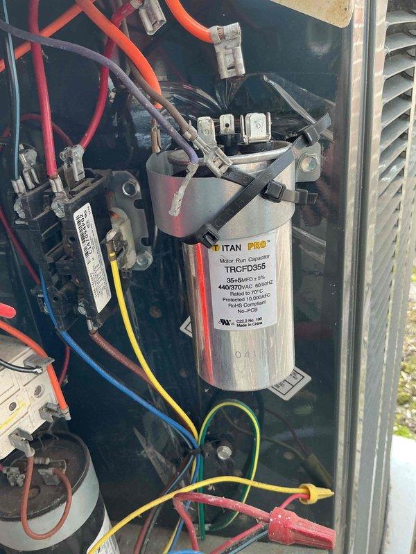 Completed comprehensive BFMA tune-up service on 18-year-old air conditioning system during scheduled morning appointment. Performed thorough inspection of all major components including blower motor assembly, electrical connections, and ductwork using digital borescope camera to examine internal components and verify proper operation. Inspected and tested TITAN PRO capacitor (TRCFD355, 440/370VAC) along with all associated wiring, contactors, and terminal connections to ensure system reliability and optimal performance for the upcoming cooling season.
