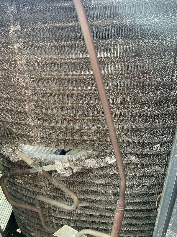 Completed BFMA tune-up on 5-year-old air conditioning system. Performed comprehensive inspection of outdoor condensing unit, including evaluation of evaporator coil which showed moderate dust and debris accumulation on fins, and assessment of electrical components including capacitor, contactor relay, and wiring connections. All components inspected and unit operational upon completion of preventative maintenance service.