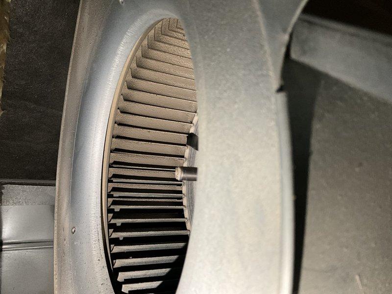 Completed comprehensive BFMA tune-up service on a 4-year-old HVAC system. Performed thorough inspection of blower assembly and motor components, noting significant dust and debris accumulation on the squirrel cage blower wheel blades. Cleaned and serviced all accessible components including the blower wheel, motor assembly, and surrounding enclosure to restore optimal airflow and system efficiency.