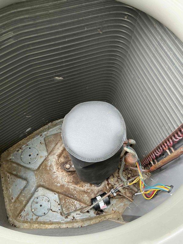 Responded to service call for Lennox condenser unit with rodent damage. Upon inspection, found compressor sound jacket severely compromised by mice activity and dual capacitor requiring replacement. Removed damaged sound jacket and installed new replacement unit to restore proper compressor insulation and noise dampening. Replaced failed dual capacitor with new component to ensure proper motor operation for both compressor and condenser fan. Verified all electrical connections secure and tested unit operation. System running within manufacturer specifications upon completion.