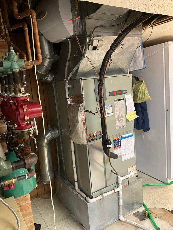 Replaced failed condensate pump and discharge tube on HVAC system to restore proper condensate drainage. Relocated and replaced relay panel with new control board, rewired connections, and verified all electrical components functioning properly with parts available on truck.
