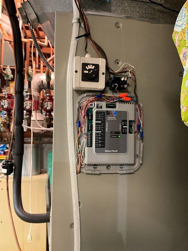 Replaced failed condensate pump and discharge tube on HVAC system to restore proper condensate drainage. Relocated and replaced relay panel with new control board, rewired connections, and verified all electrical components functioning properly with parts available on truck.